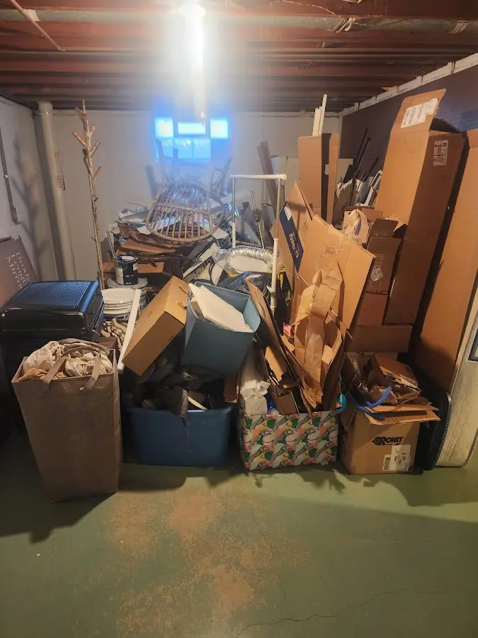 Roll-off dumpster container at job site for Yard Waste Dumpster Rental in West Springfield